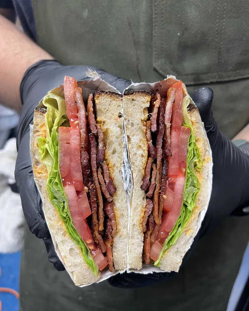 BLT on toasted sourdough, cut in half